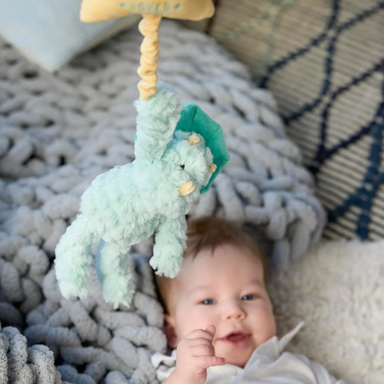 DEMDACO Musical Pull Toy 22 x 6 Inch Polyester, Soft Cuddly, Plush Stuffed Animal, Plays Twinkle, Twinkle, Little Star, Teal and Yellow, Triceratops