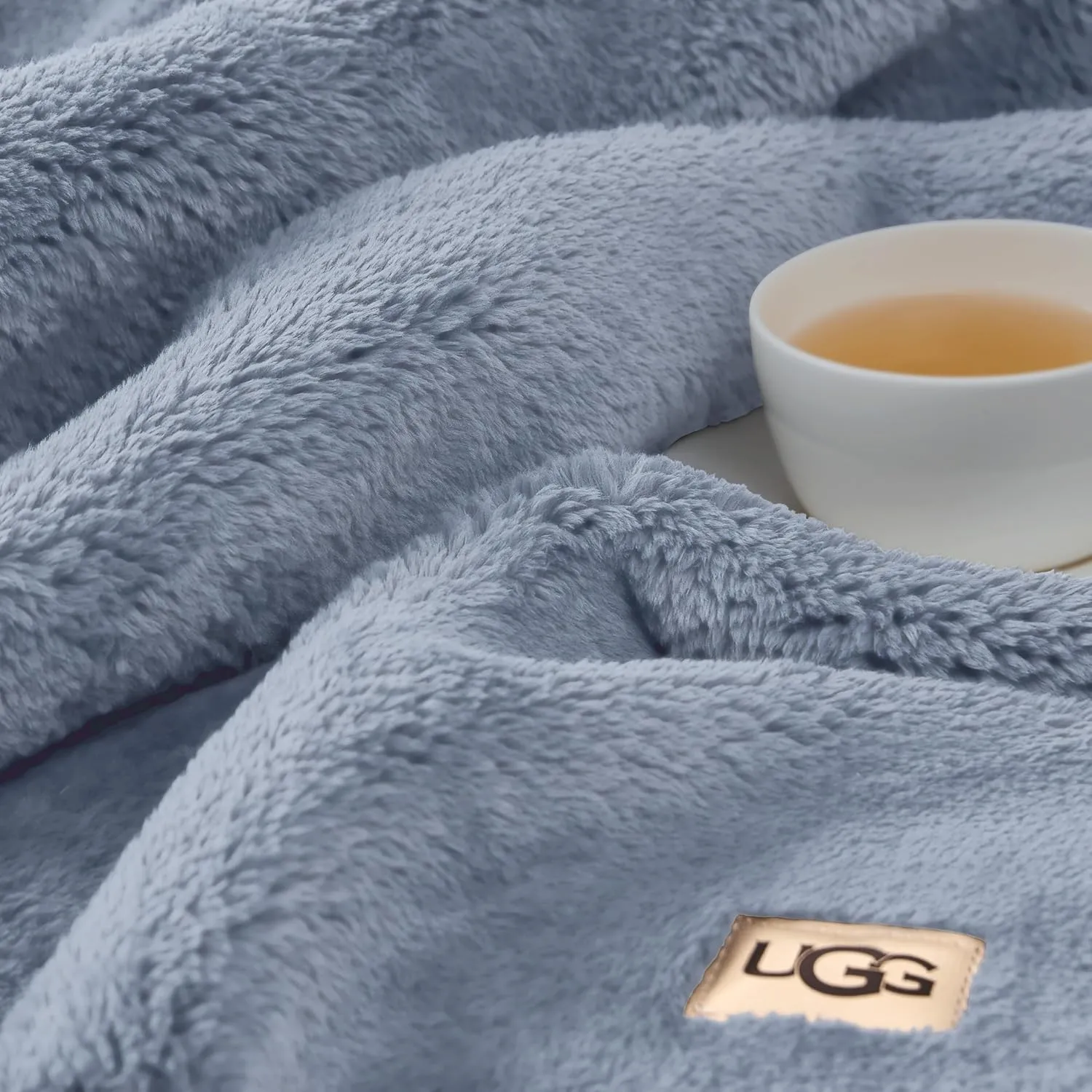 UGG Whitecap Plush Throw Blanket Fleece Lightweight Soft Cozy Throw for Couch or Bed Luxury Home Decor for Living Room Machine Washable Hypoallergenic Flannel Blankets, 50-inch x 70-inch, Denim Blue